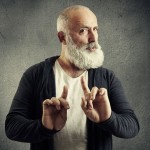 An older man denying help