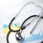 a stethoscopes and some medical charts