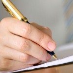 Person filling out a form