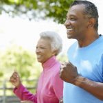 Senior African American Couple Jogging In Park