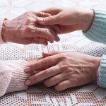 Senior's Hands and young hands
