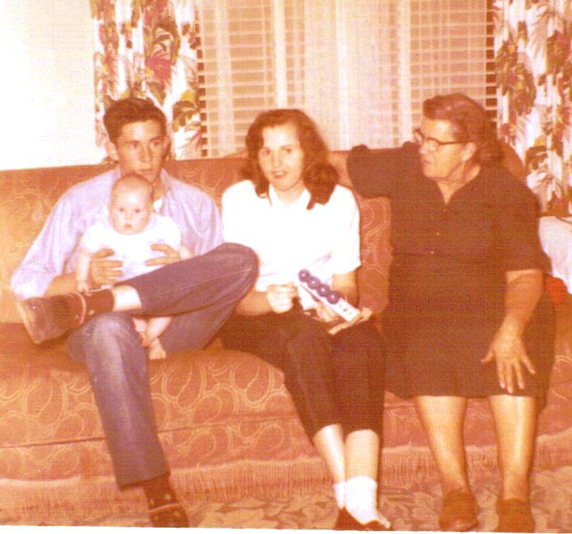 Uncle Louis Holding me, momma and Granny Mann