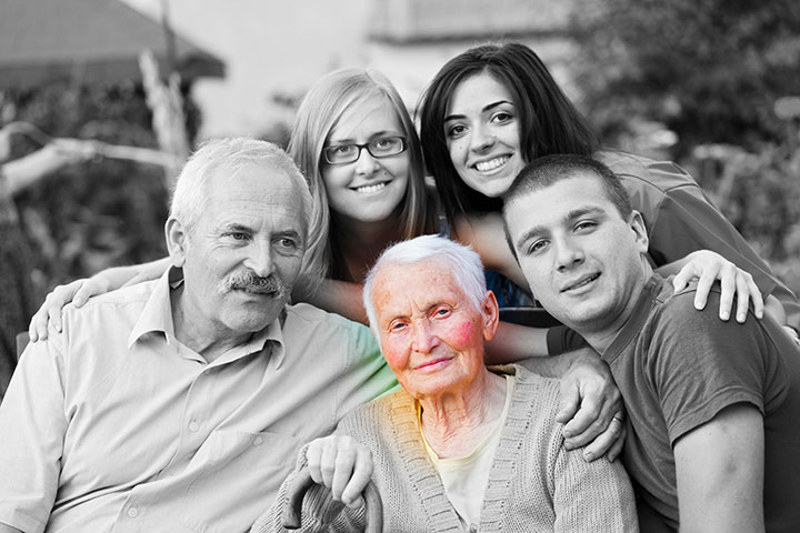 Family visiting elderly relative at nursing home