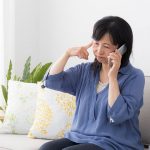 Asian woman on cell phone