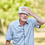 Elderly man suffering from the heat